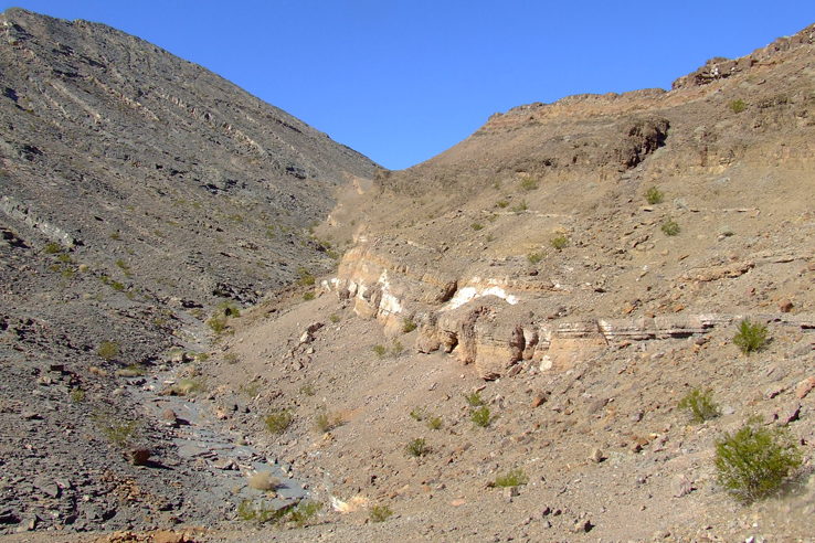 Photo of a barren hillside.